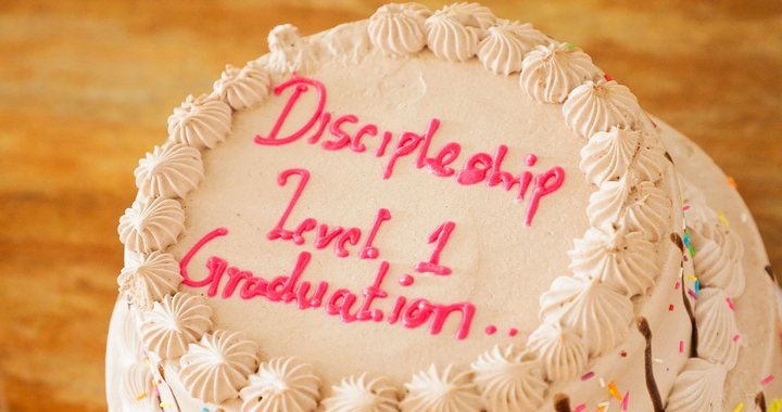 Cake cutting at the Discipleship Level 1 graduation
